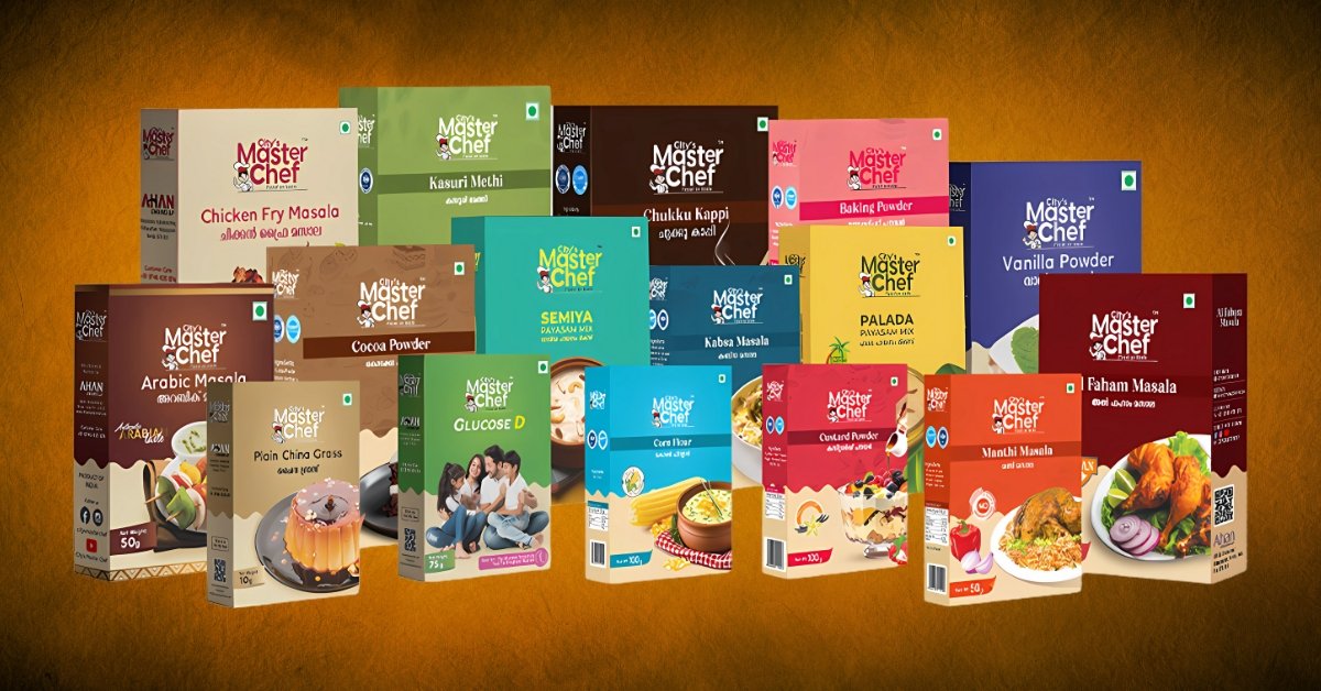 A variety of packaged food products from the brand "City's Master Chef" are displayed in rows against a gradient orange-brown background. The products include spices, dessert mixes, masalas, powders, and beverage ingredients. Some visible items are Chicken Fry Masala, Arabic Masala, Kasuri Methi, Cocoa Powder, Corn Flour, Glucose D, Vanilla Powder, and others. Each package features colorful and distinct branding with the brand's logo prominently visible.