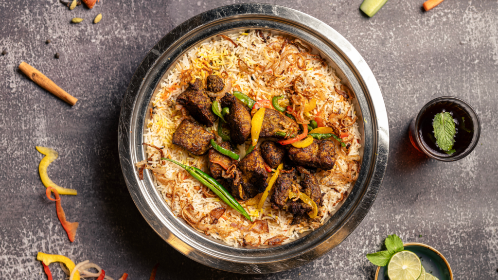City’s Master Chef best Kabsa masala mix dish with spiced meat, fried onions, and vegetables served over fragrant rice.
